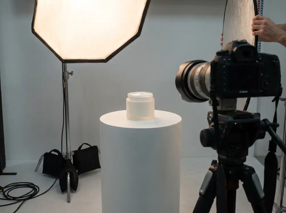Skincare product shoot with a cream jar under studio light